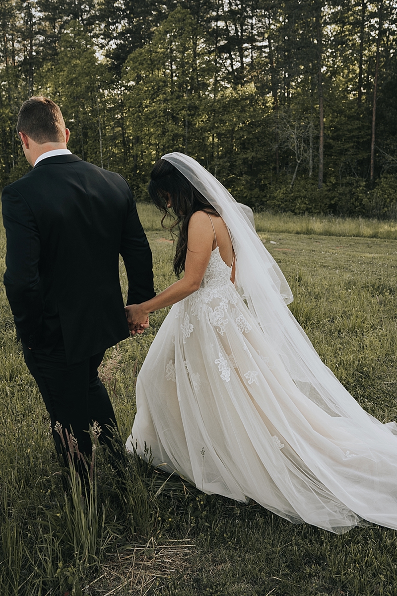 bride in monique lhuillier wedding dress